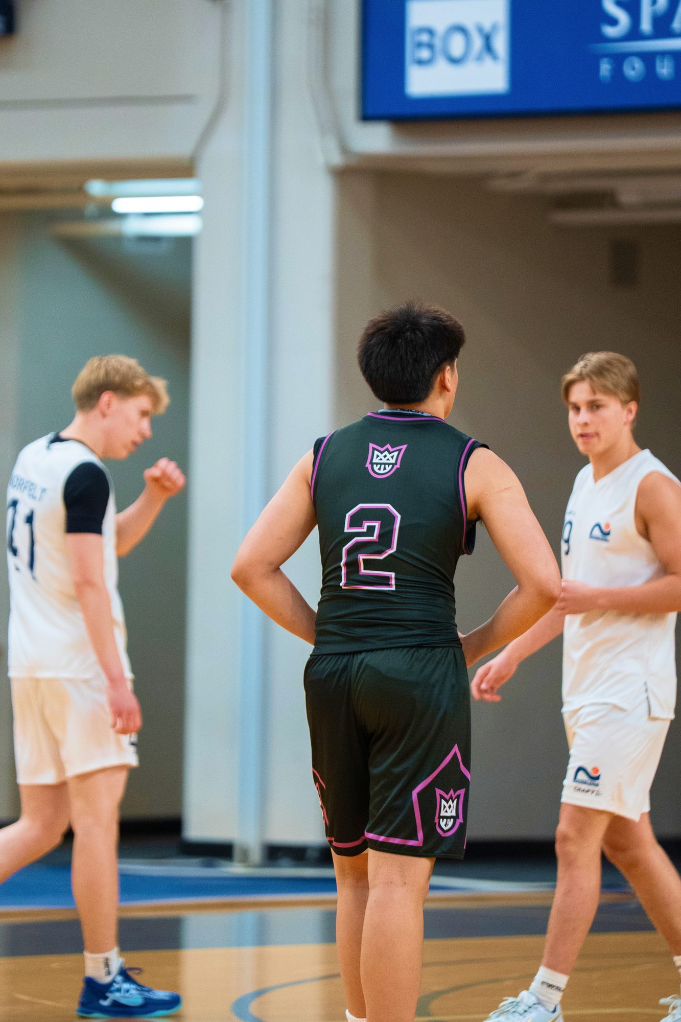 New West Elite player in the number 2 jersey standing on the court